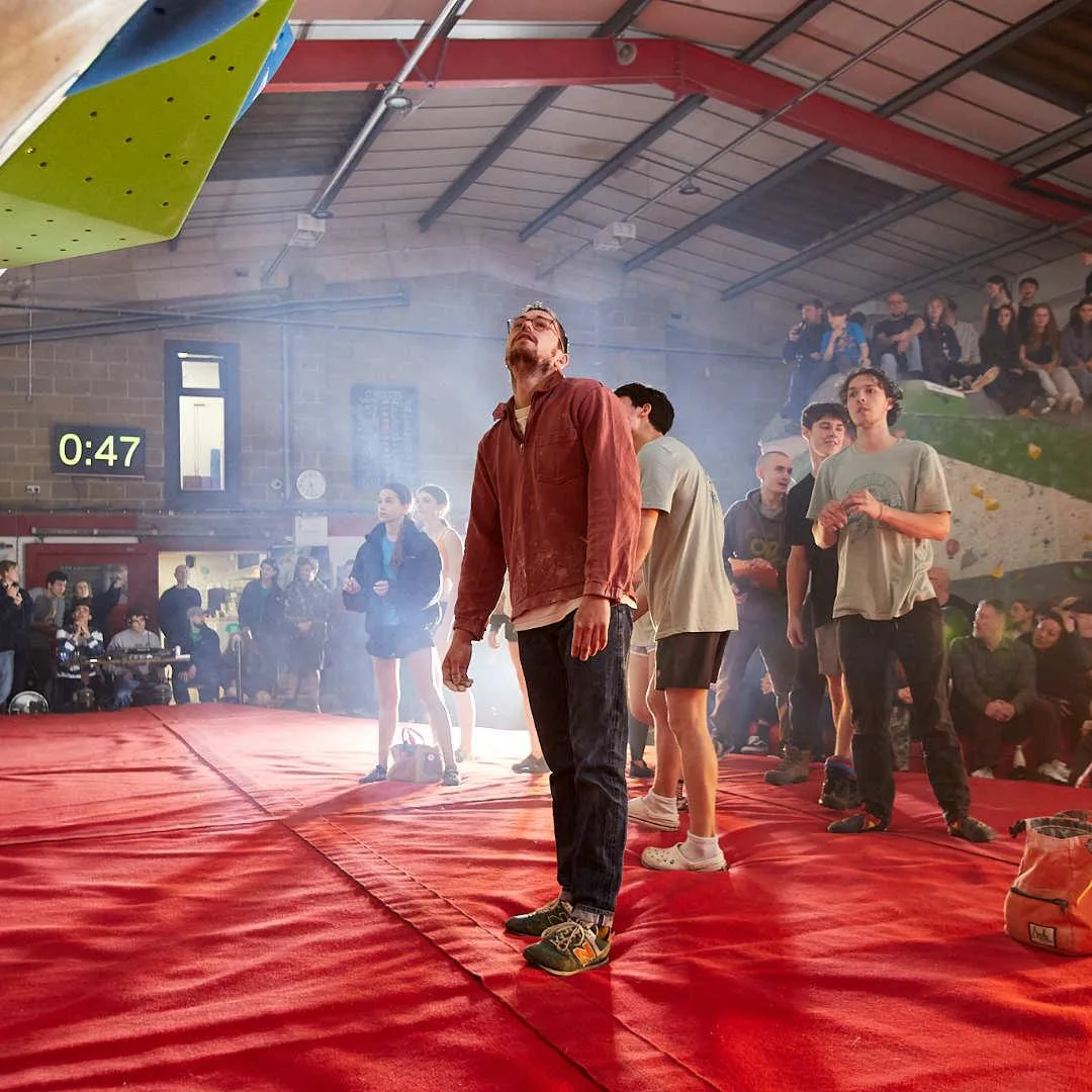 Climbers in front of the competition wall
